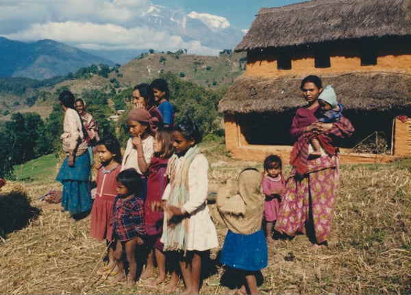 Nepali Family by their house